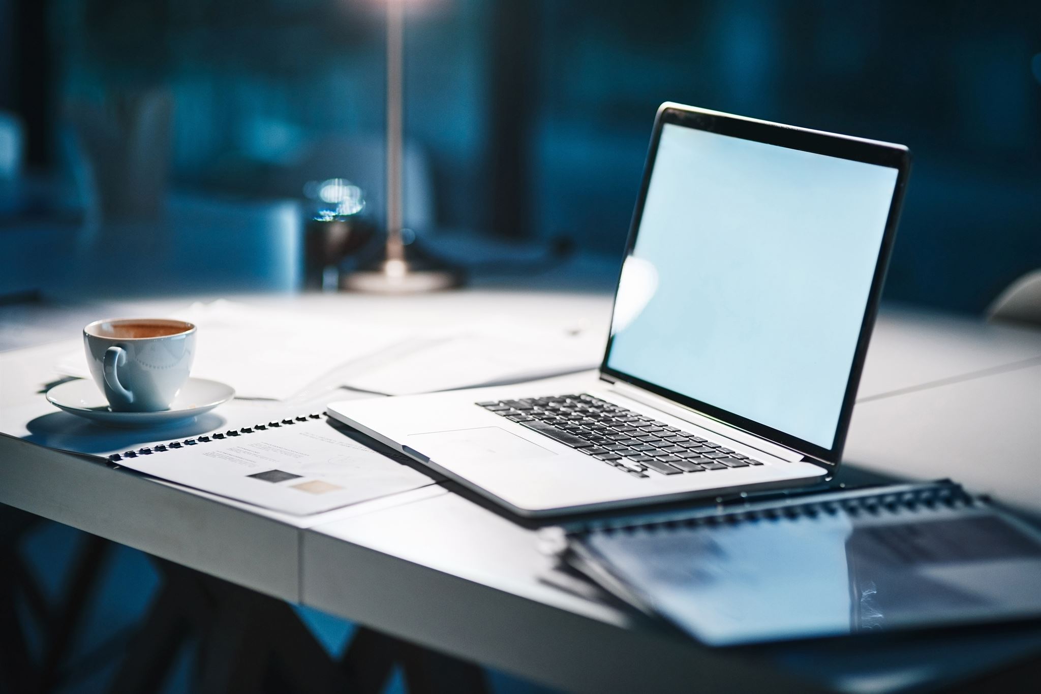 Laptop-open-on-desk-at-night